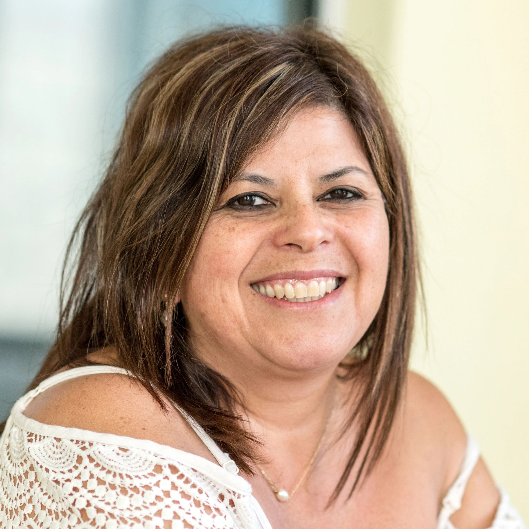 Smiling customer portrait in natural light.
